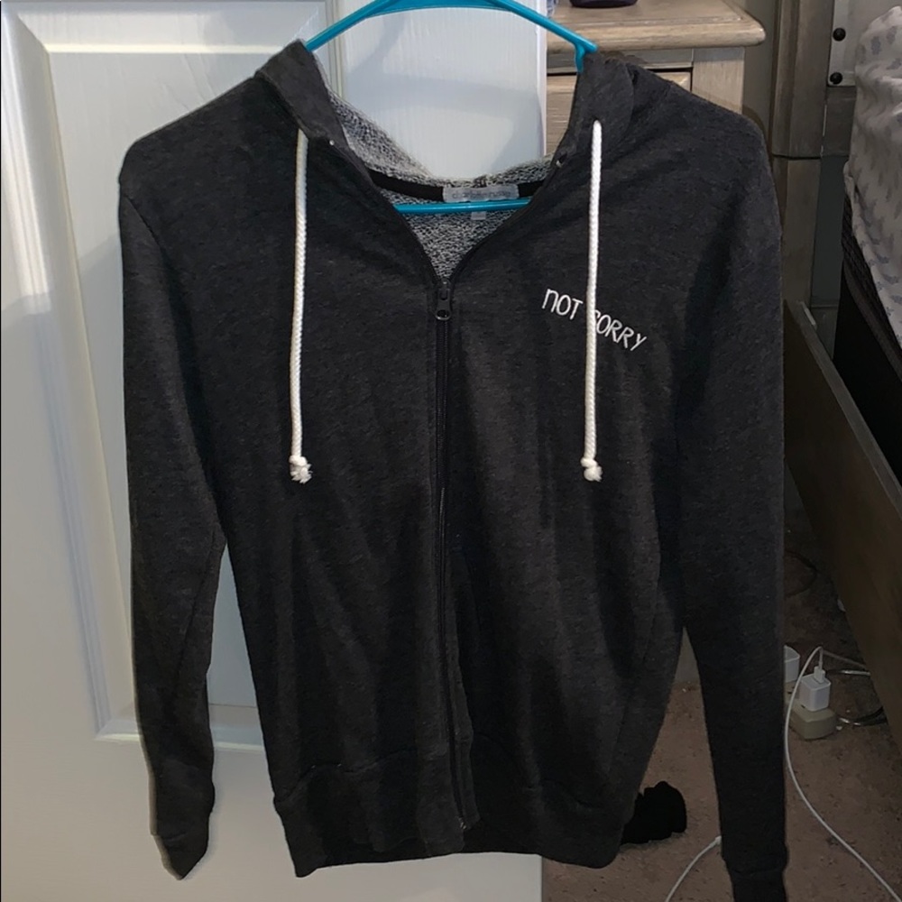 Not sorry zip up